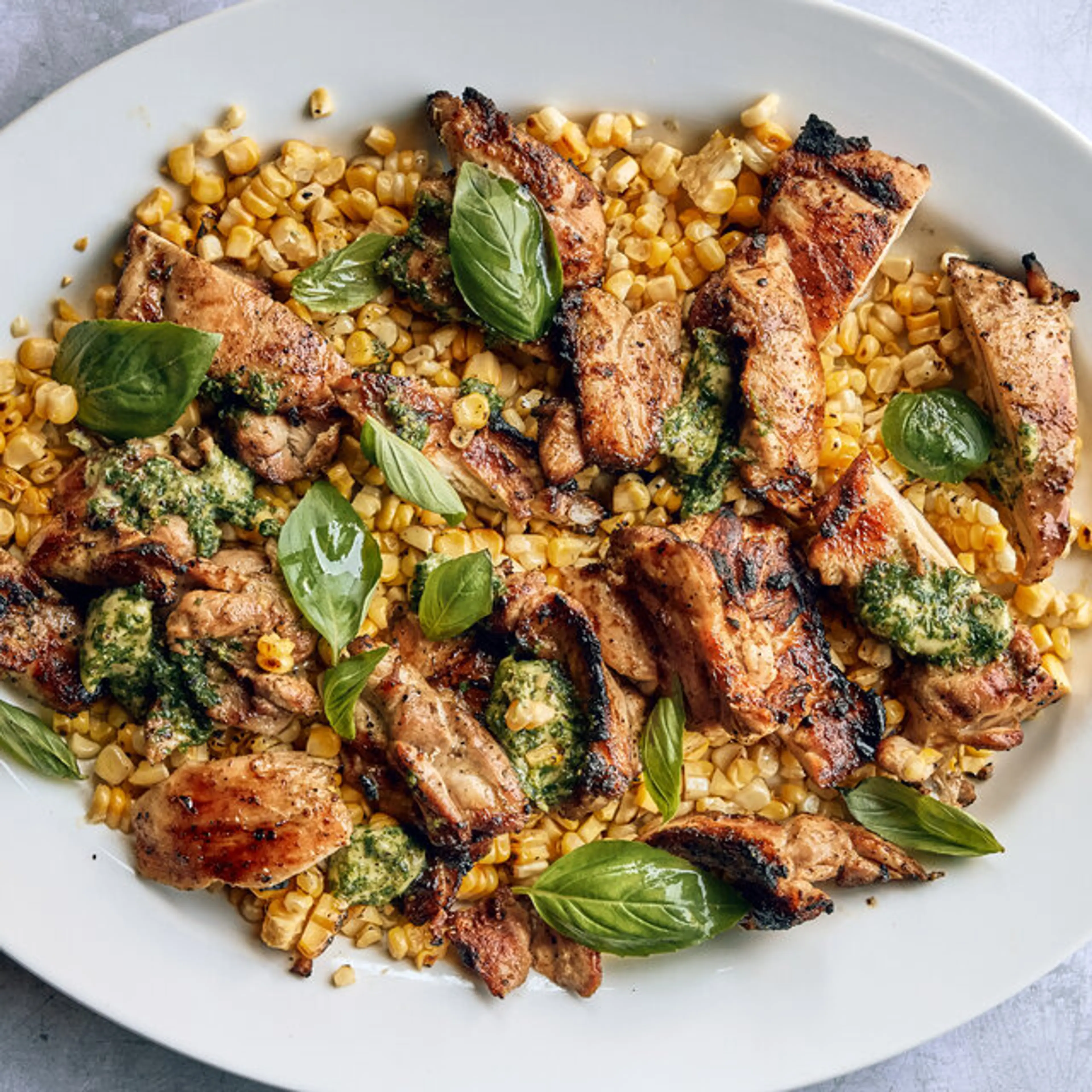 Grilled Chicken Thighs and Corn With Lime-Basil Butter