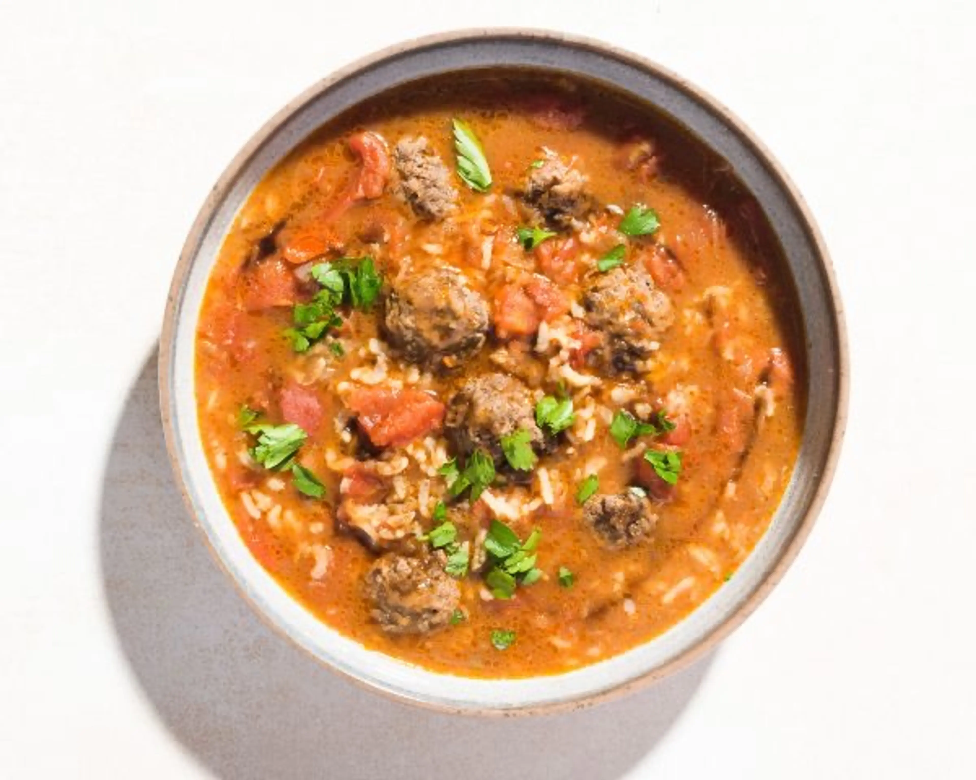Syrian-Style Meatball Soup with Rice and Tomatoes