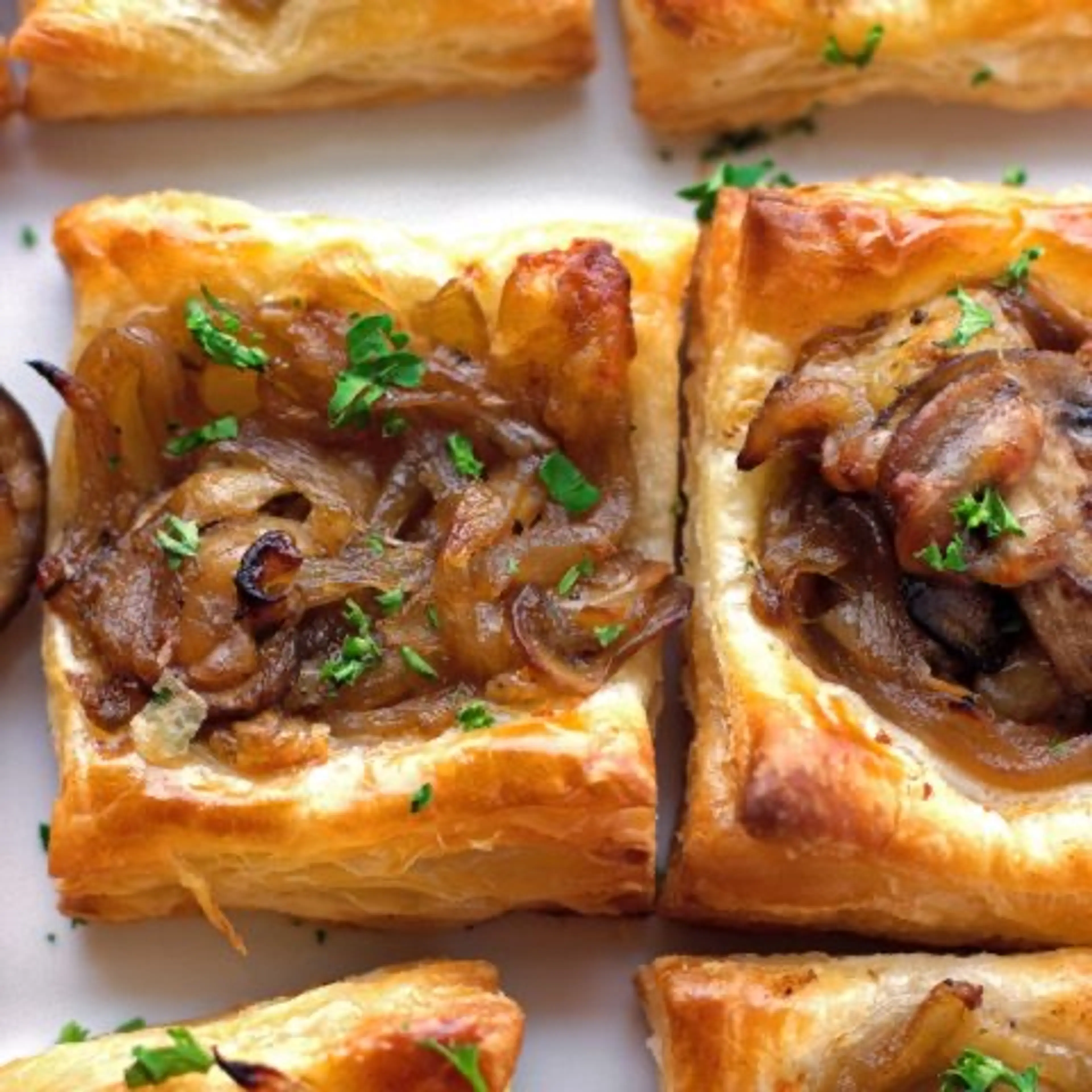 Caramelized Onion Puff Pastry Bites with Gruyere and Mushroo