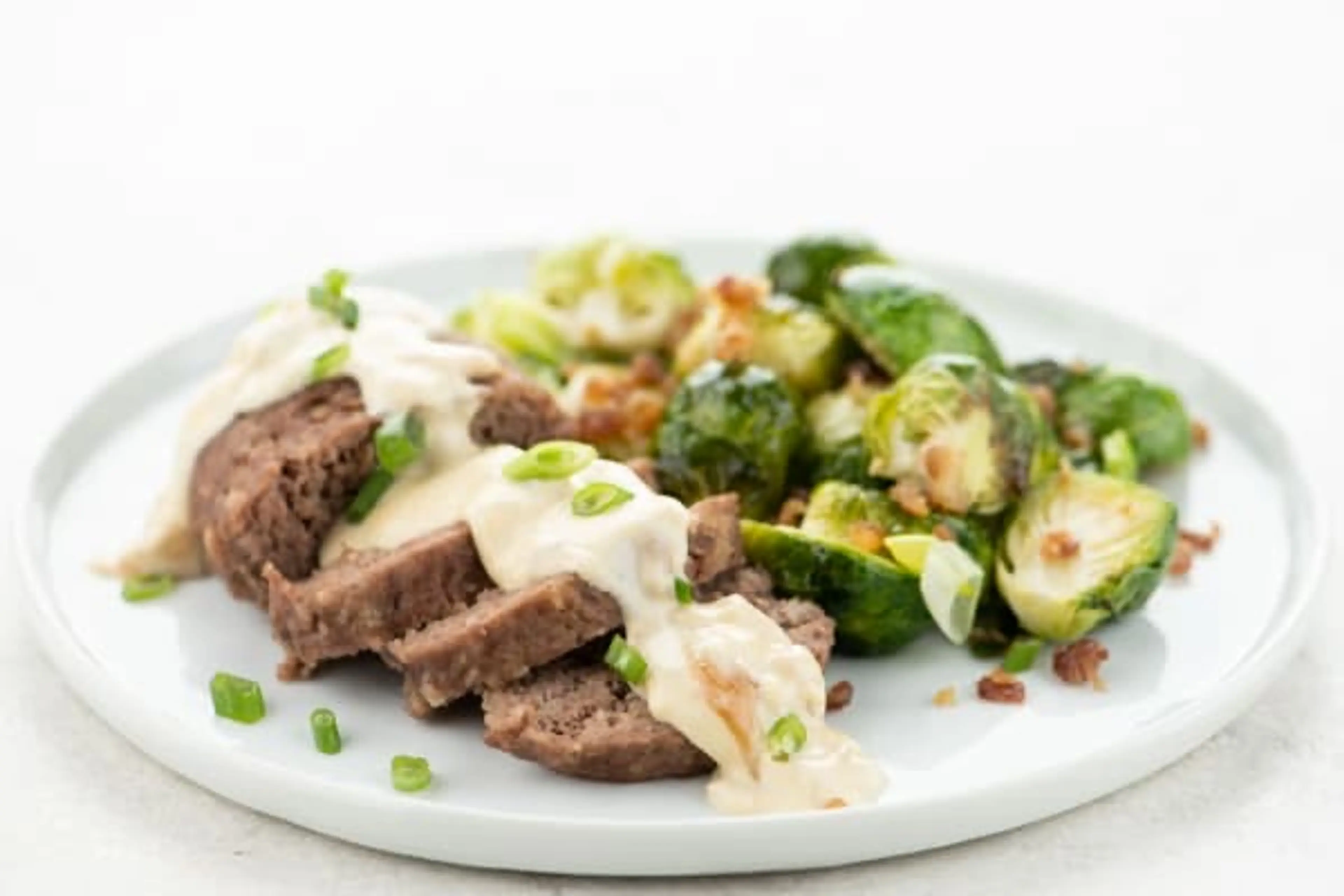 French Onion Beef Meatloaf with crispy bacon Brussels sprout