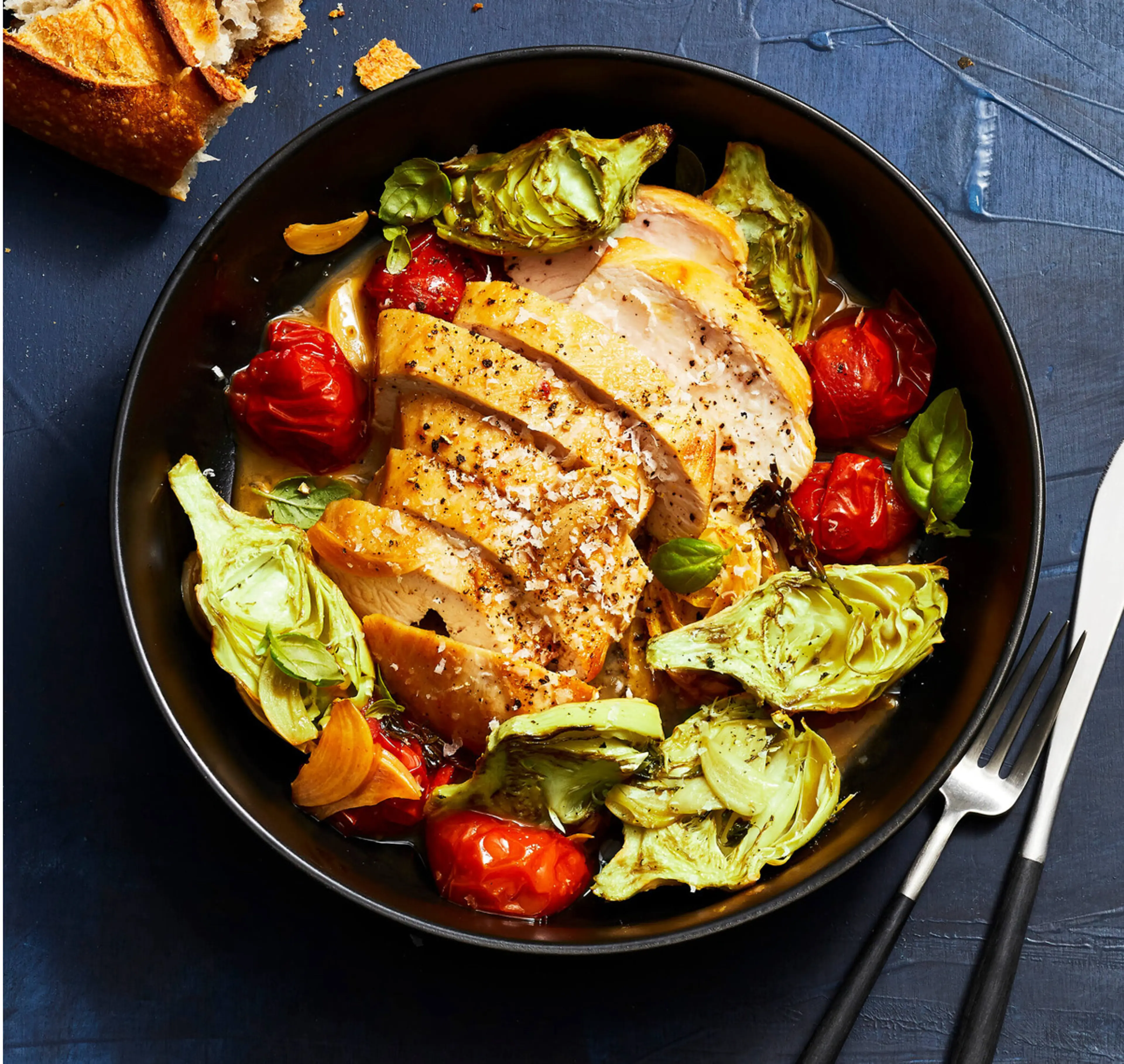 SAUTÉED CHICKEN AND TOMATOES WITH ROASTED ARTICHOKES