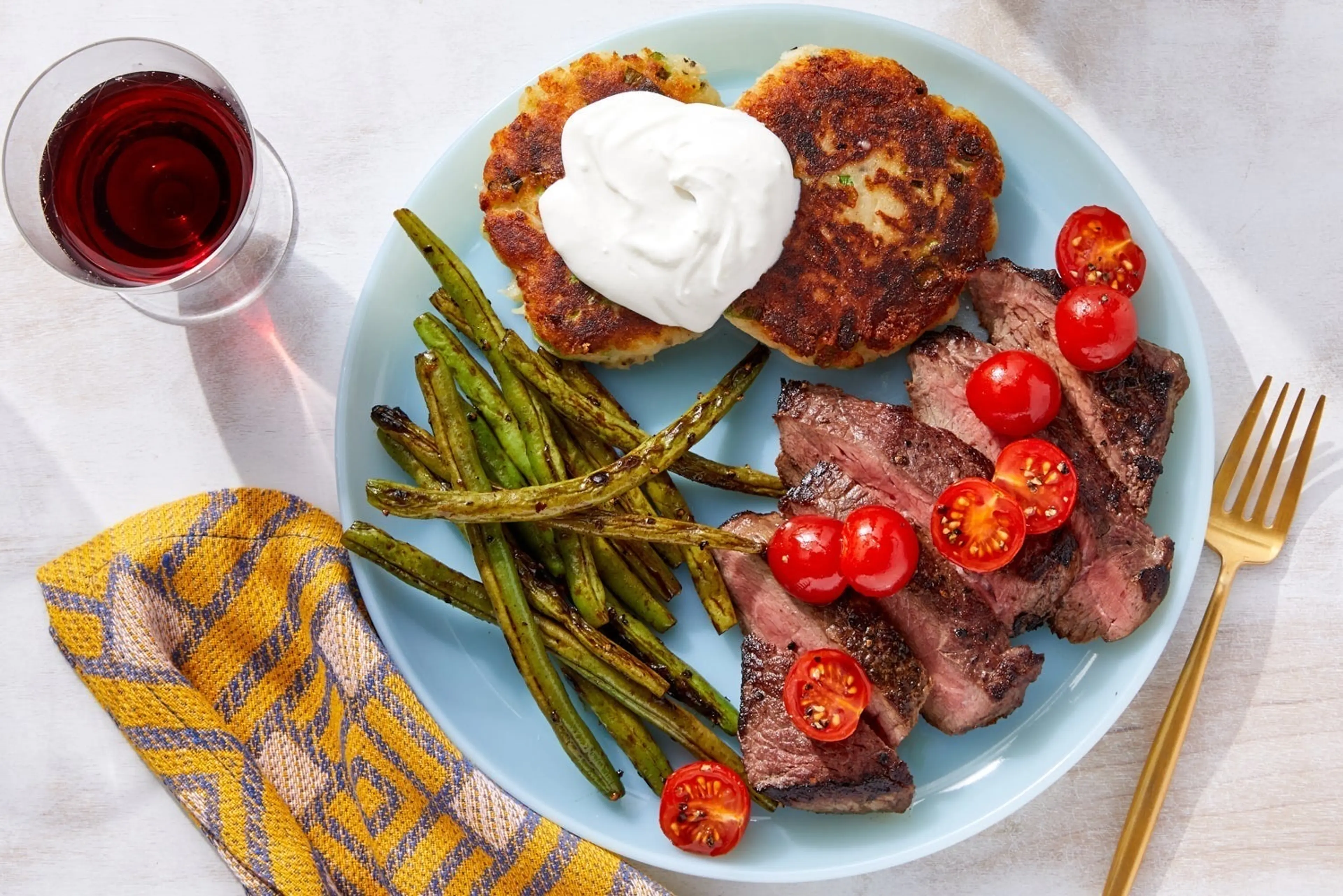 Pan-Seared Steaks & Green Beans with Sour Cream & Cheesy Sca