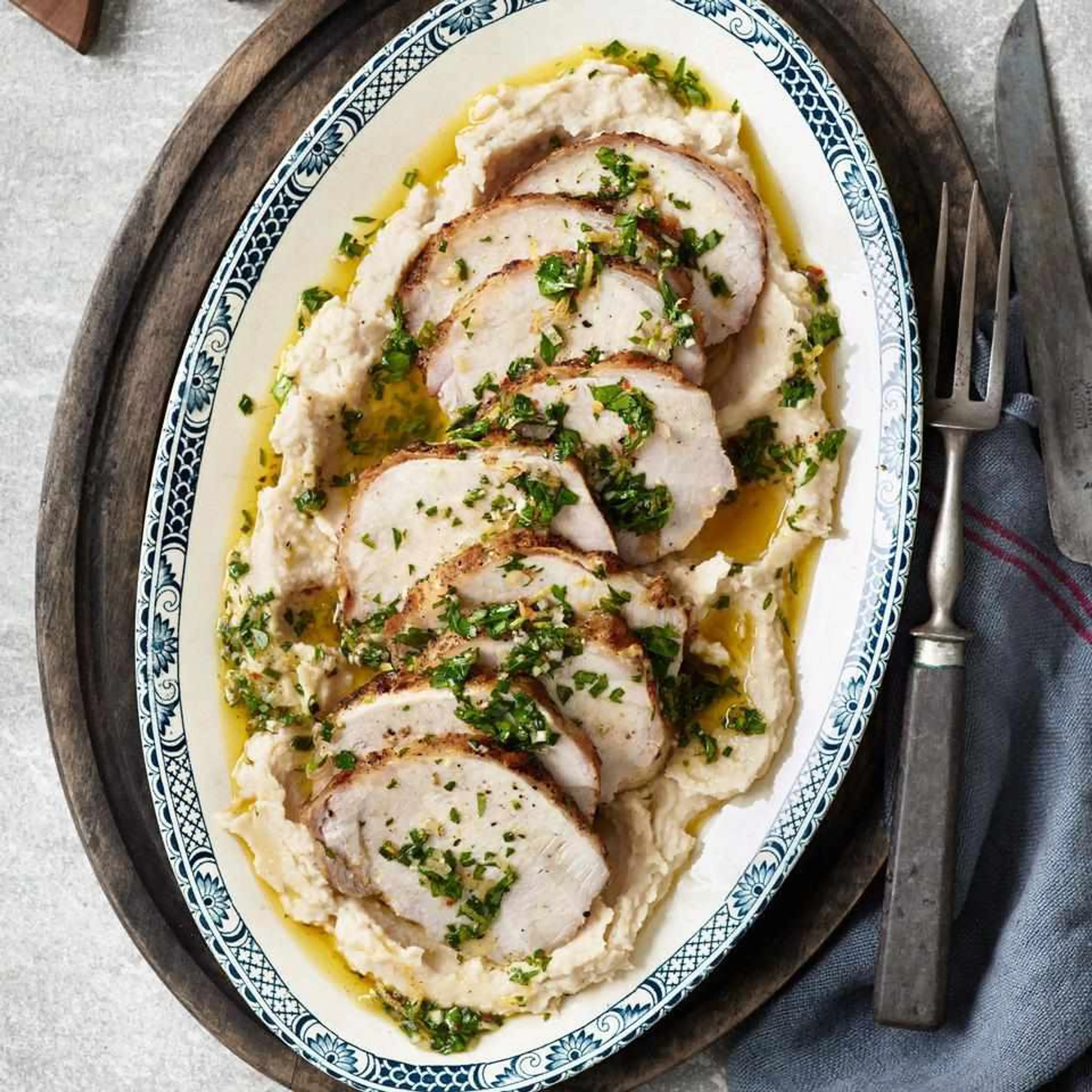 Grilled Pork Loin with White Bean Puree & Lemon Herb Vinaigr