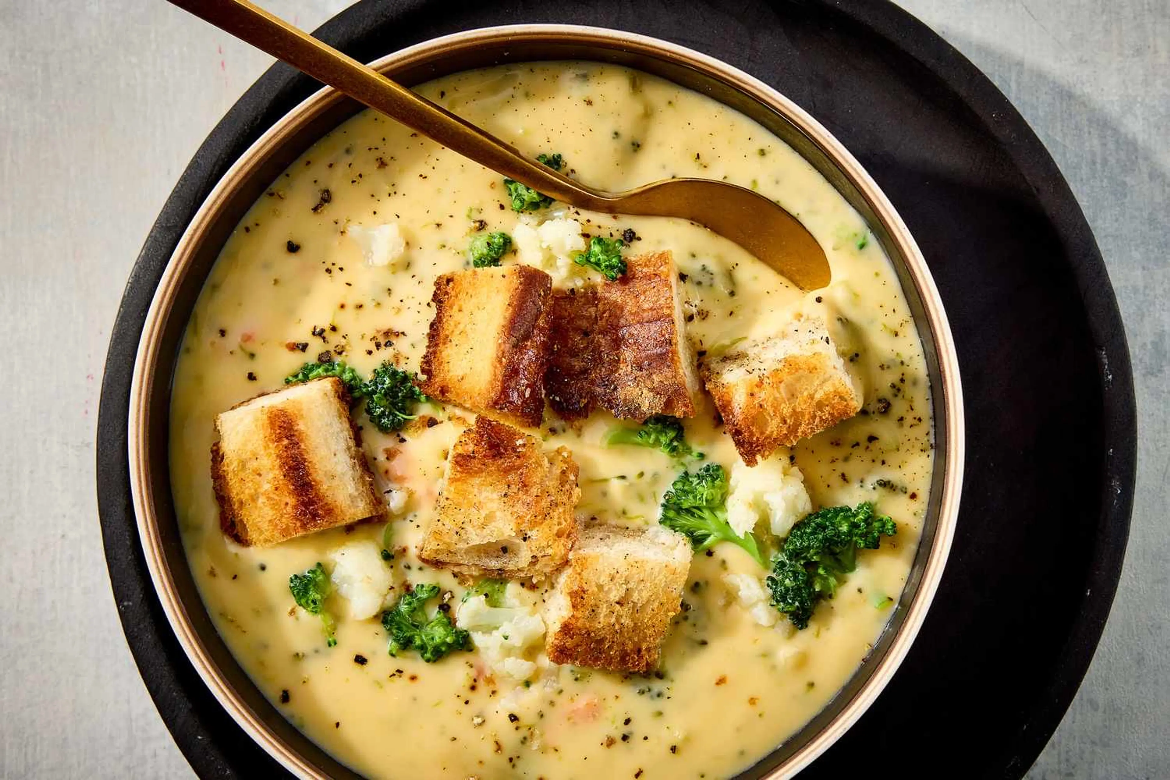 Broccoli, Cauliflower, and Cheddar Soup with Garlic Croutons