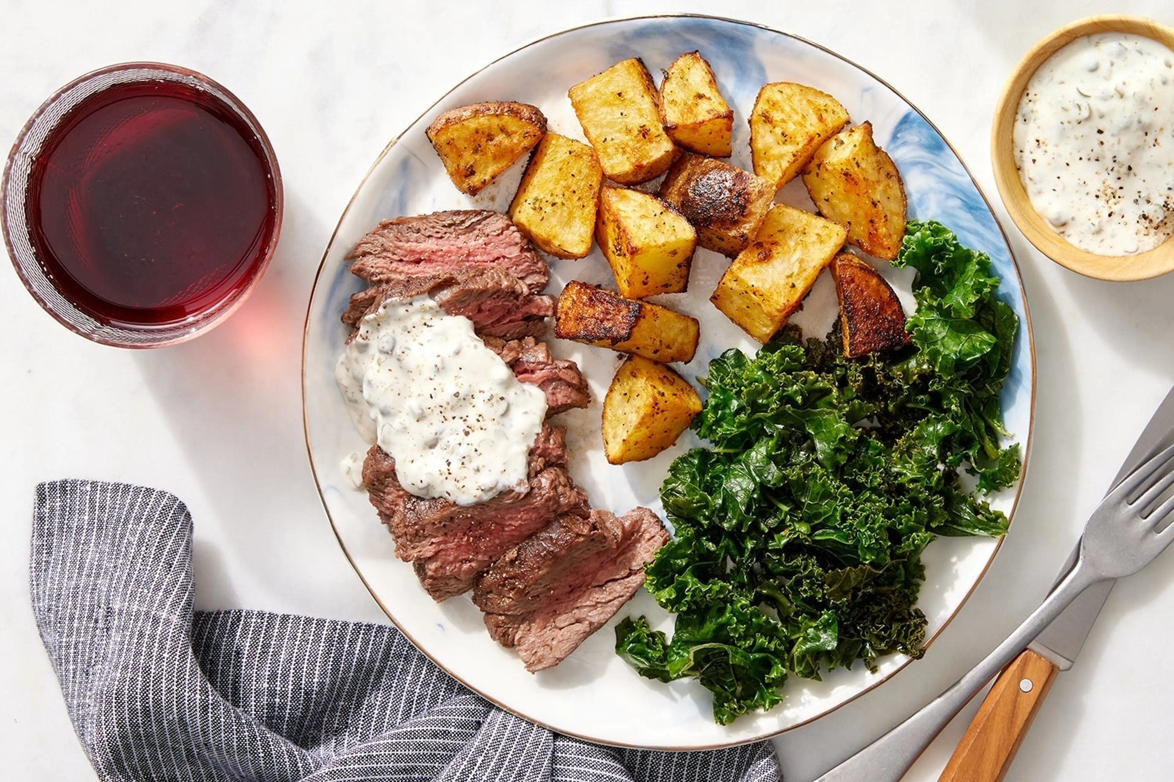 Seared Steaks & Caper Aioli with Roasted Potatoes & Kale