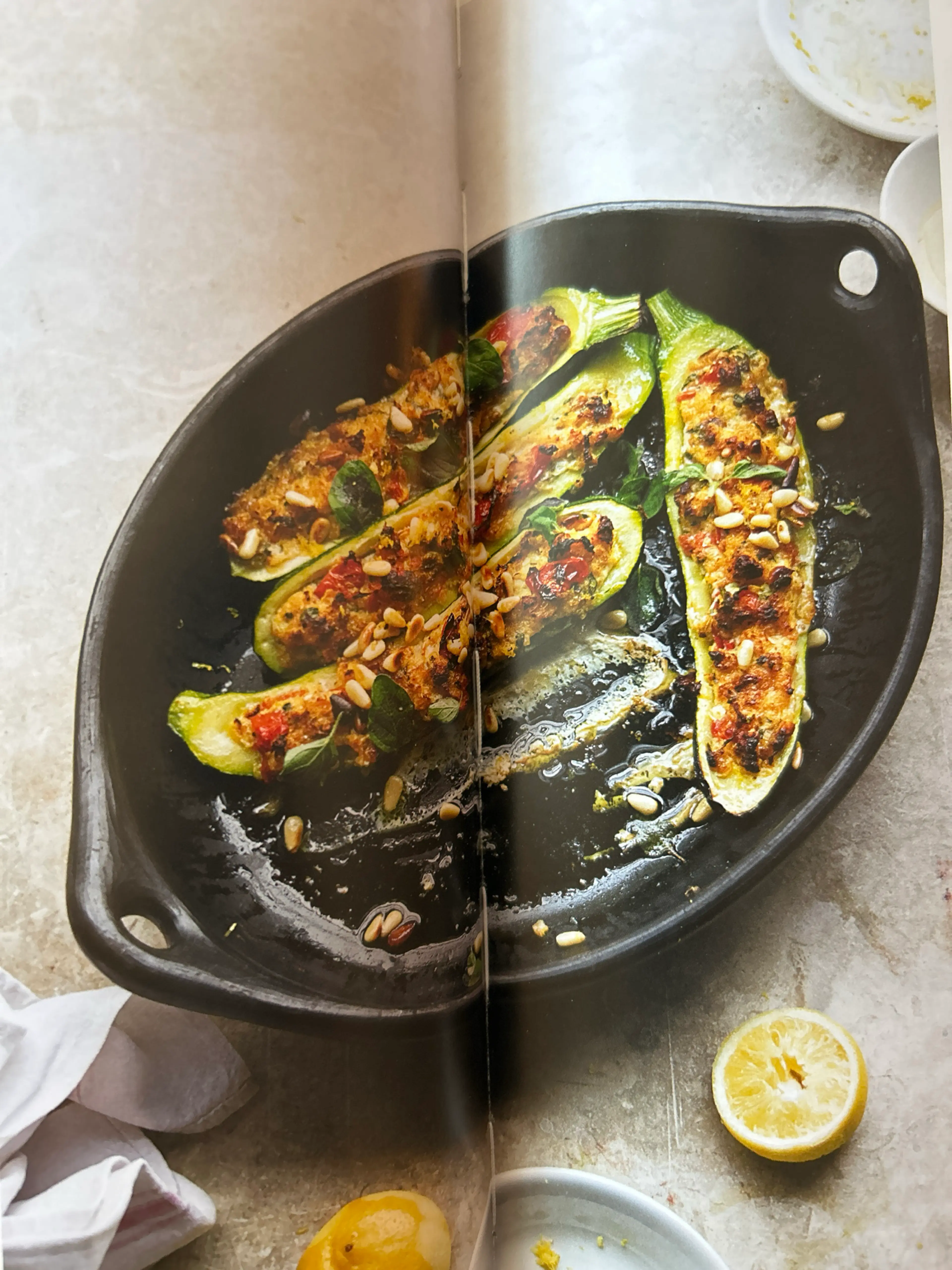 Stuffed zucchini with pine nut salsa