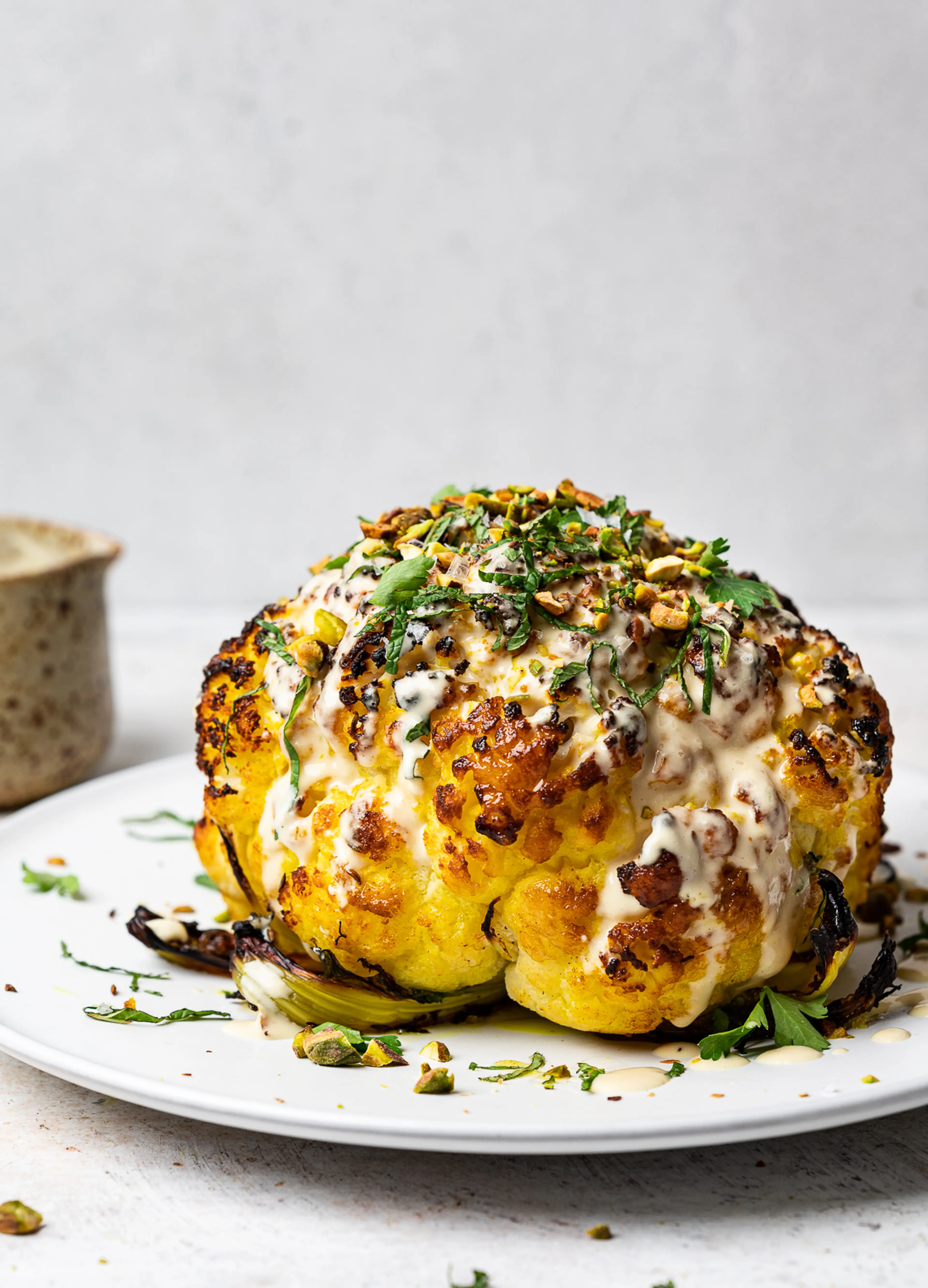 Whole Roasted Cauliflower with Tahini Sauce