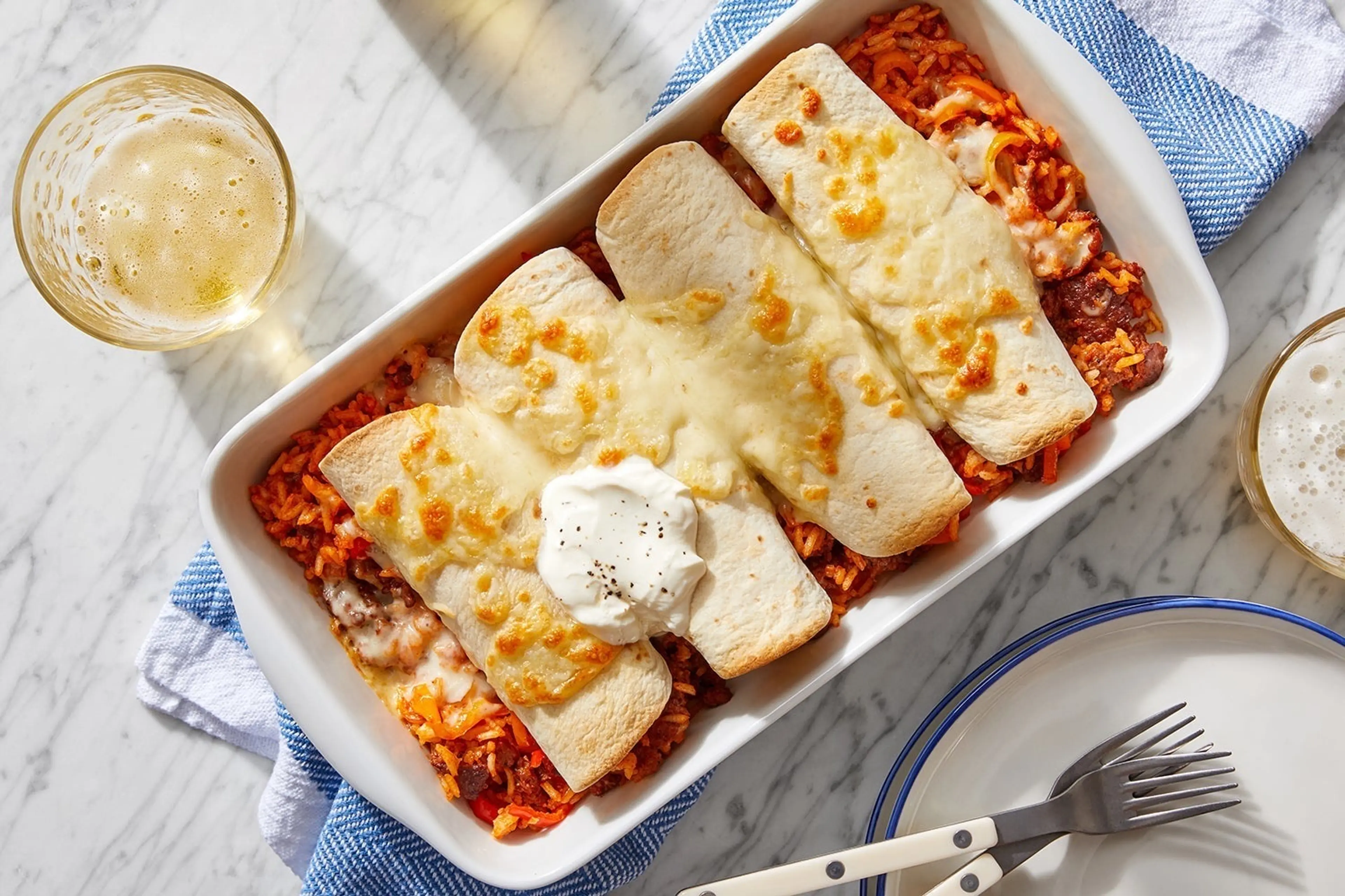 Cheesy Pork Chorizo Enchiladas with Shishito Peppers & Rice