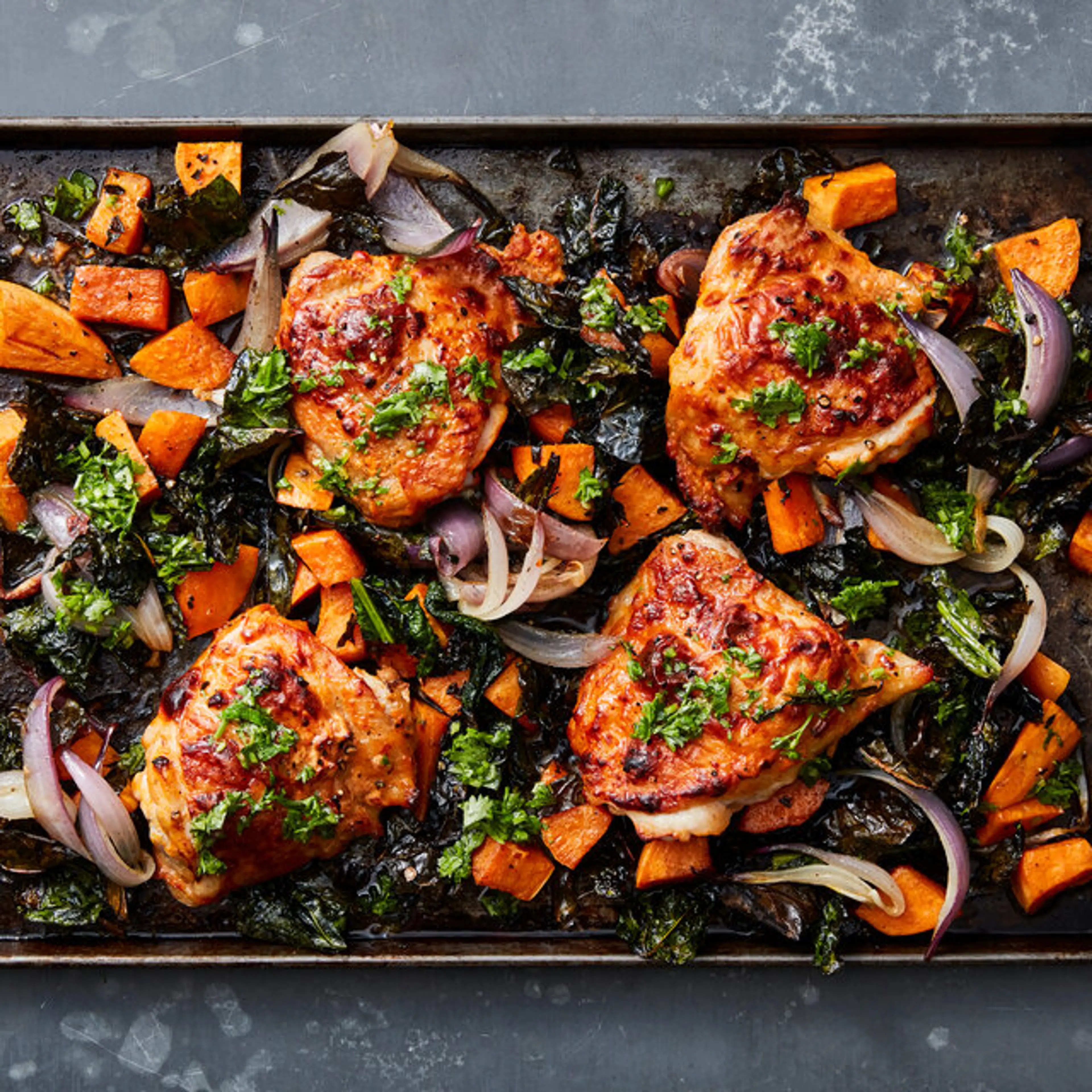 Spicy Sheet-Pan Chicken With Sweet Potatoes and Kale