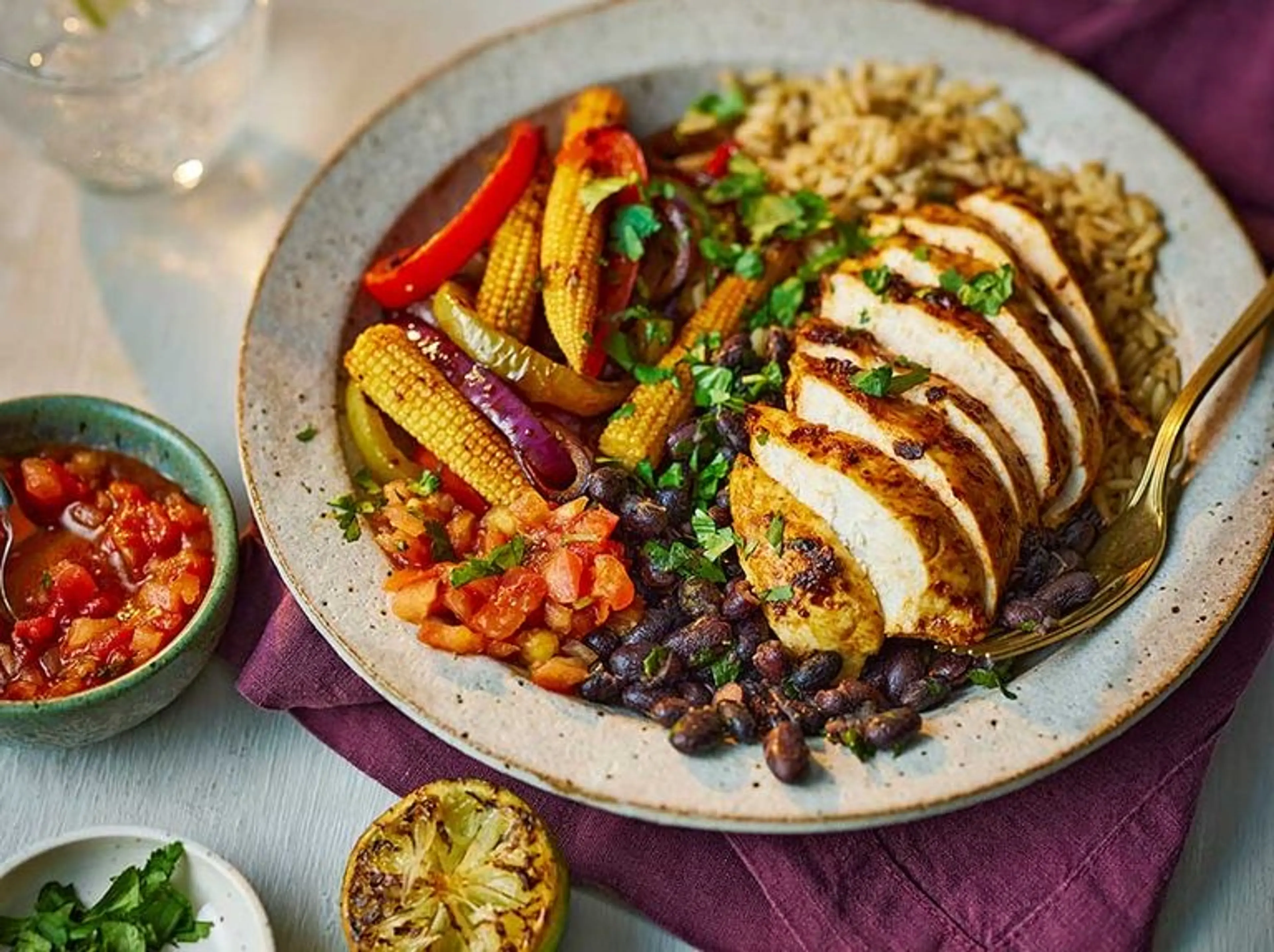 Fajita chicken rice bowl with burnt lime