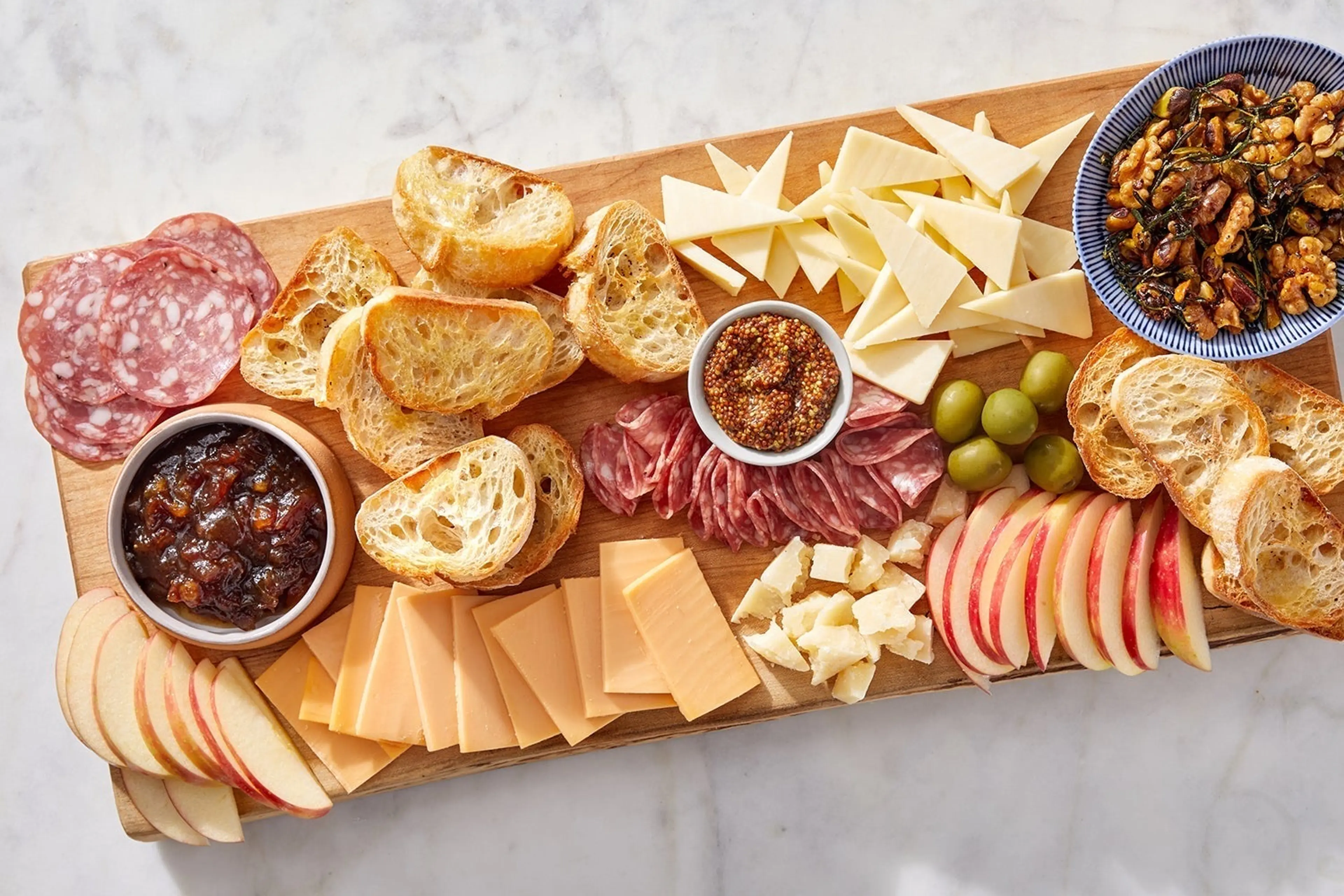 Charcuterie Board with Date Compote, Rosemary Nut Mix & Chee