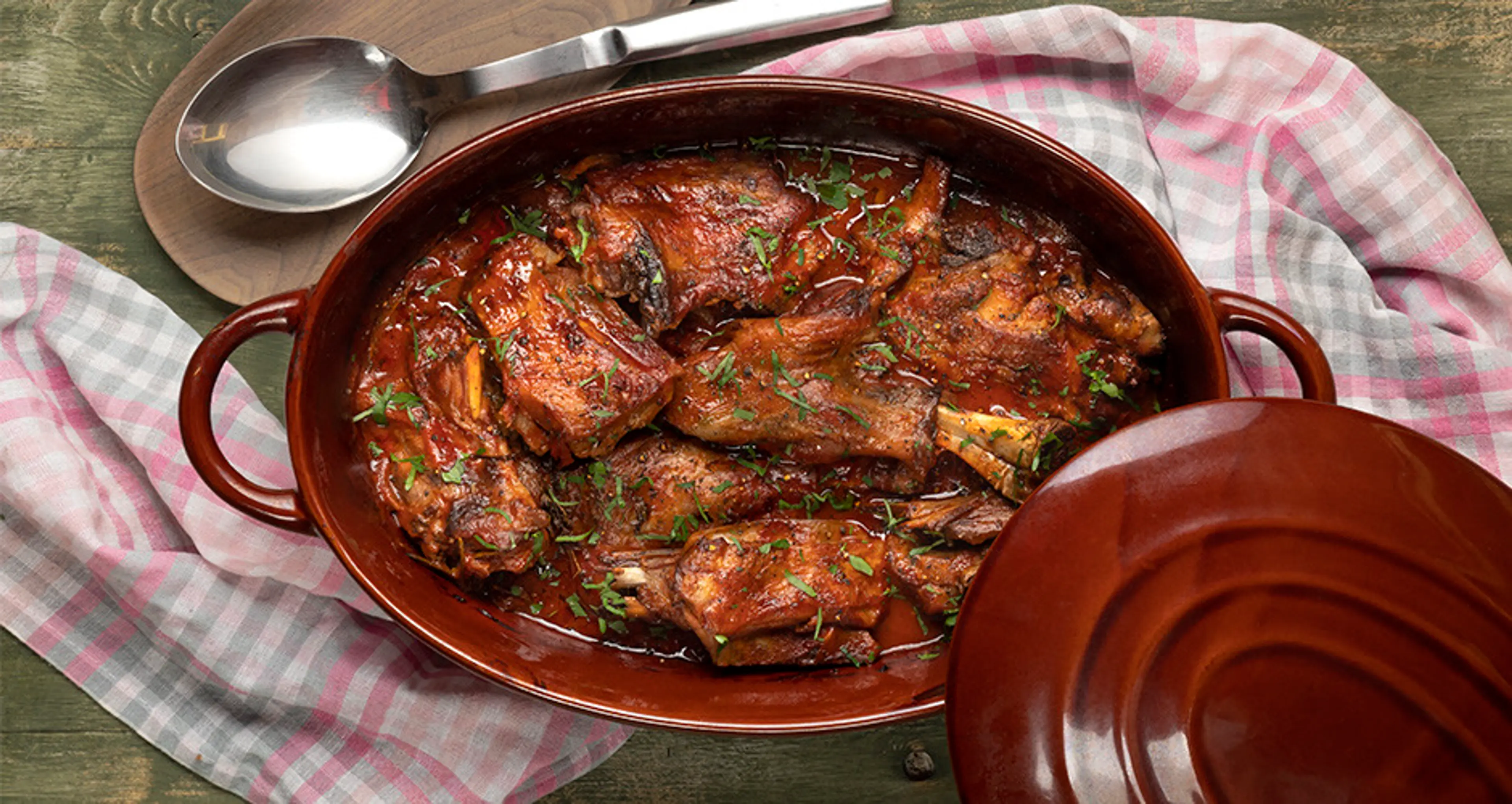 Greek-style roast goat in tomato sauce