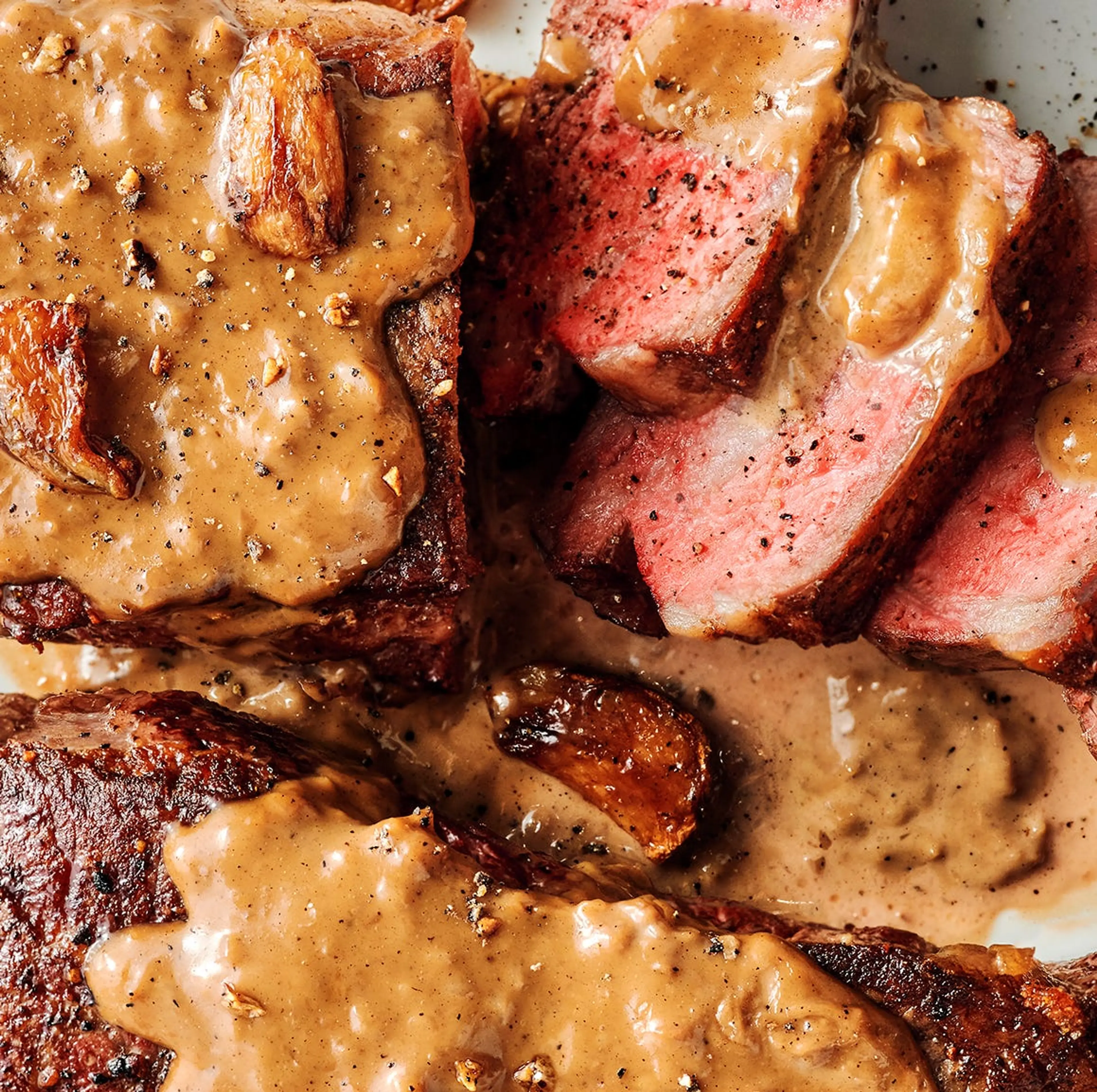 Steak With Bourbon Garlic Cream Sauce