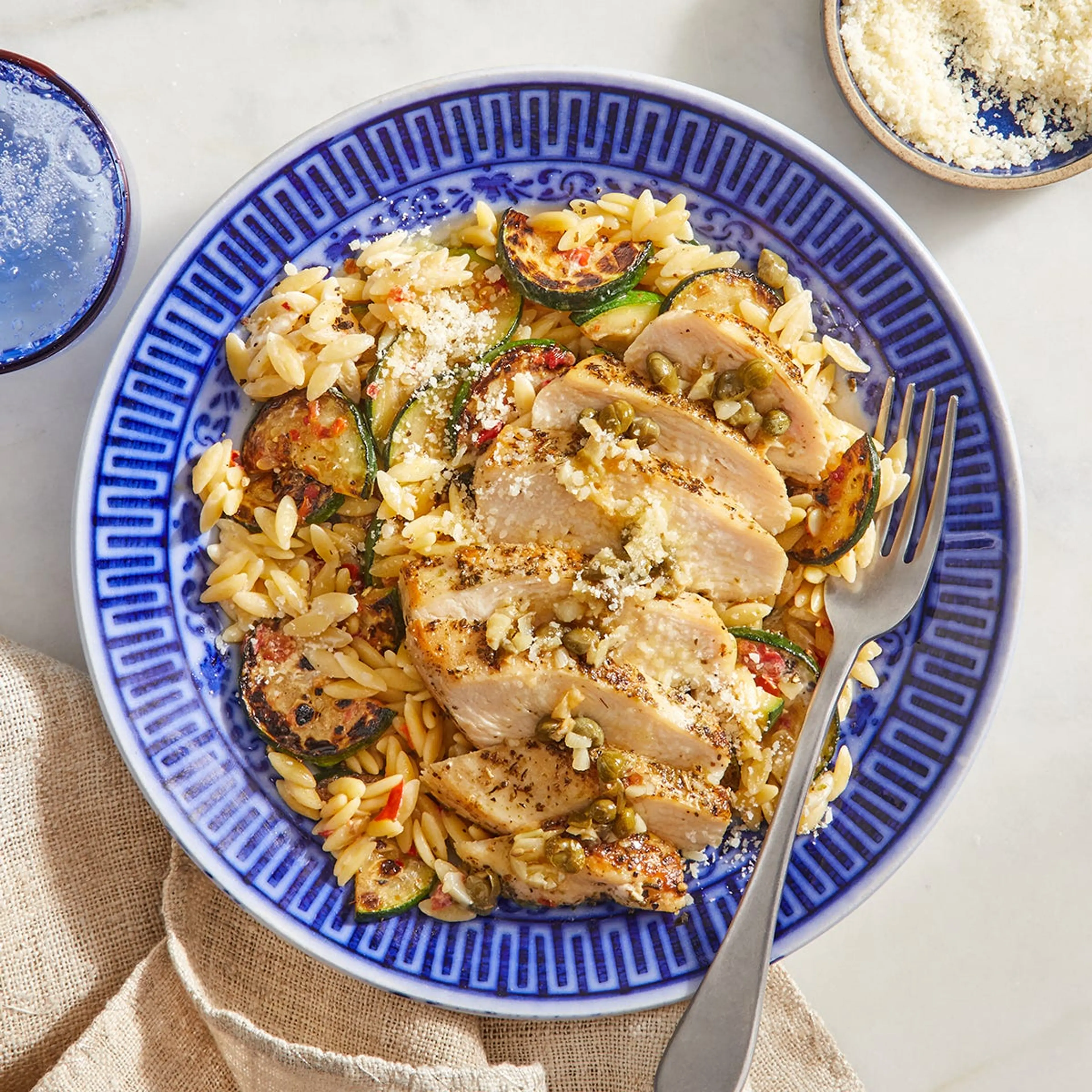 Lemon-Caper Chicken with Calabrian Zucchini & Orzo