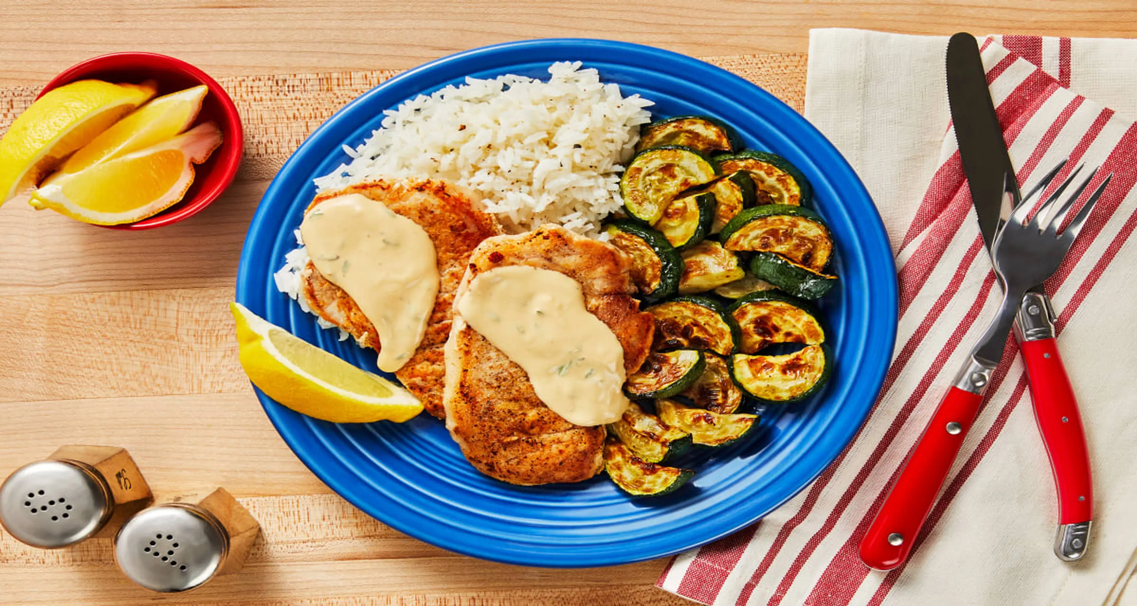 Lemon-Thyme Pork with Roasted Zucchini & Garlic Herb Rice