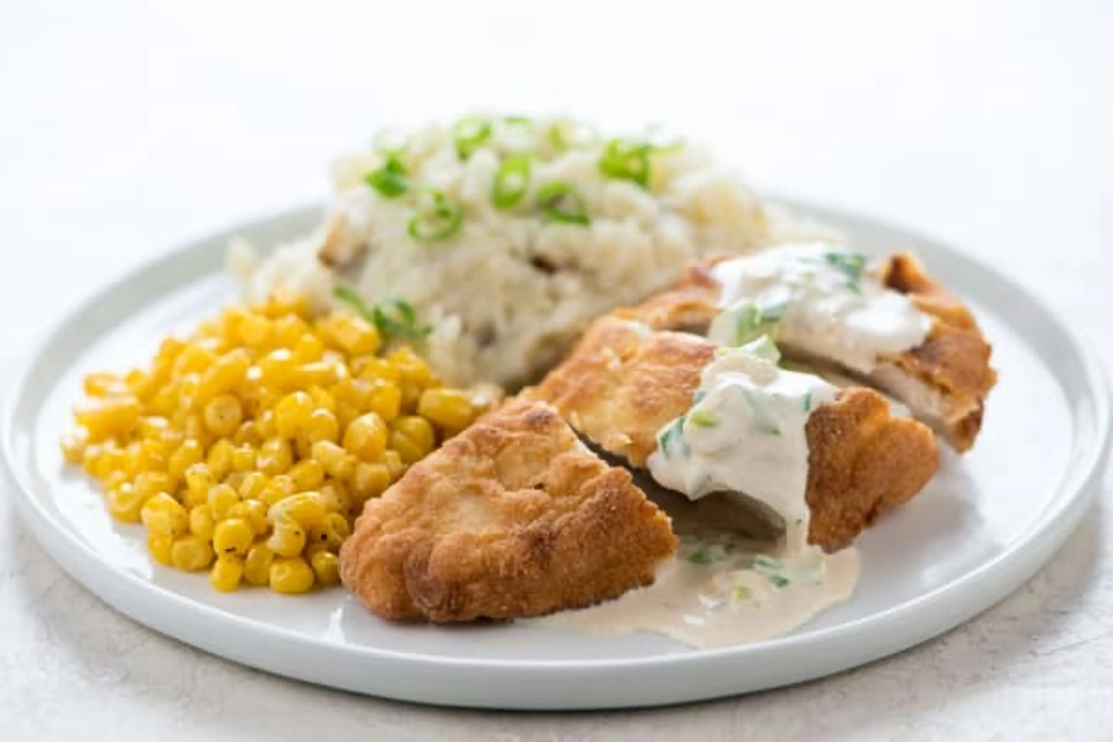 Farmhouse Fried Chicken with mashed potatoes, green onion gr