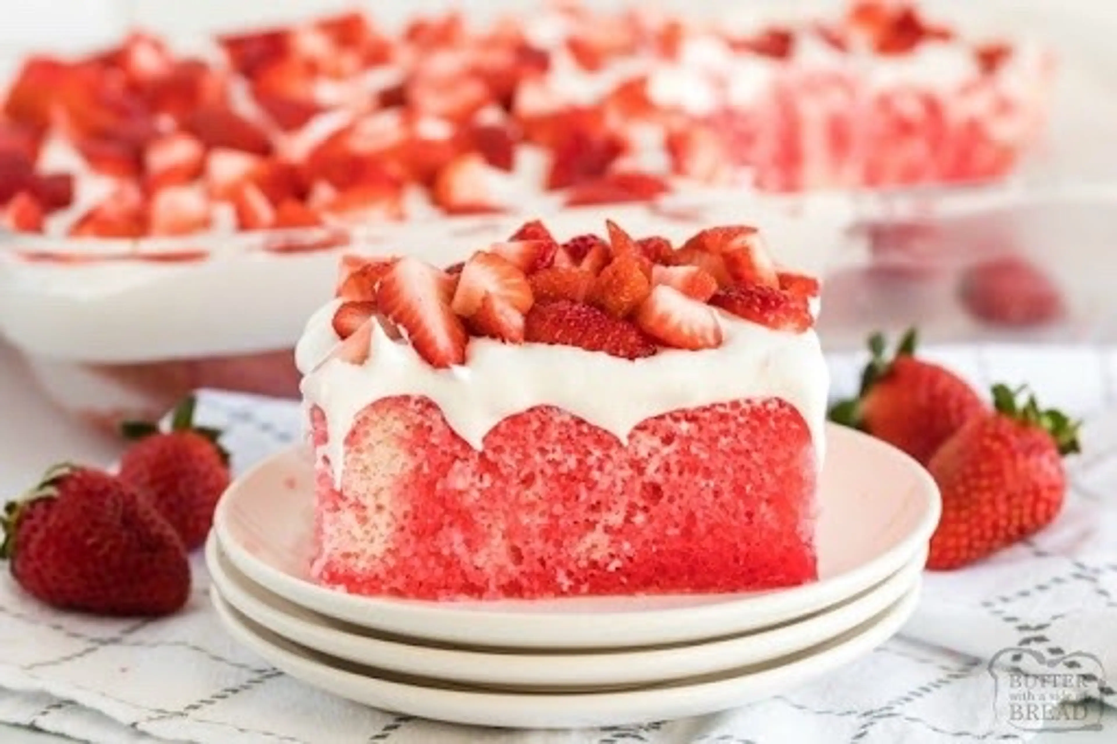 STRAWBERRIES & CREAM POKE CAKE