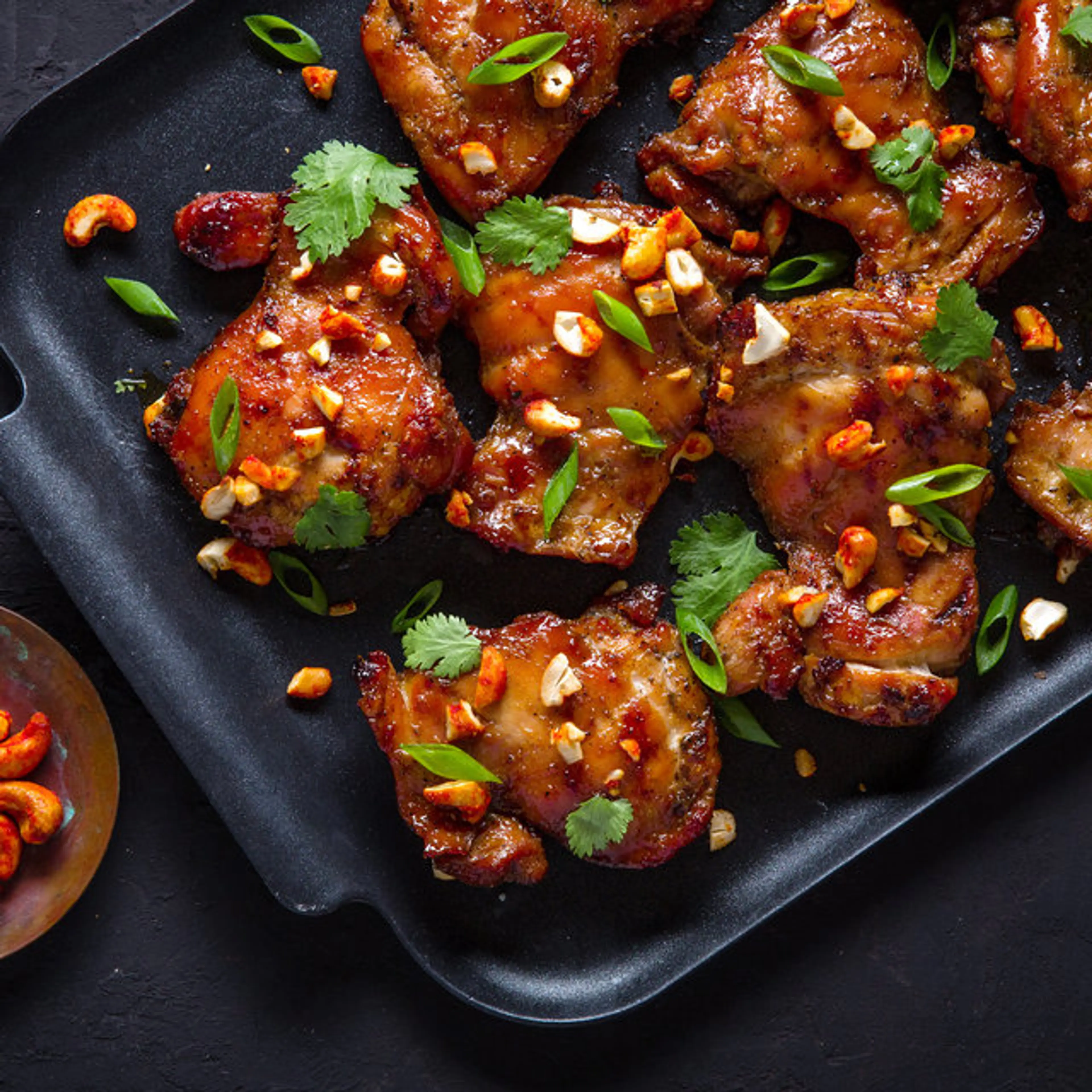 Grilled Soy-Basted Chicken Thighs With Spicy Cashews