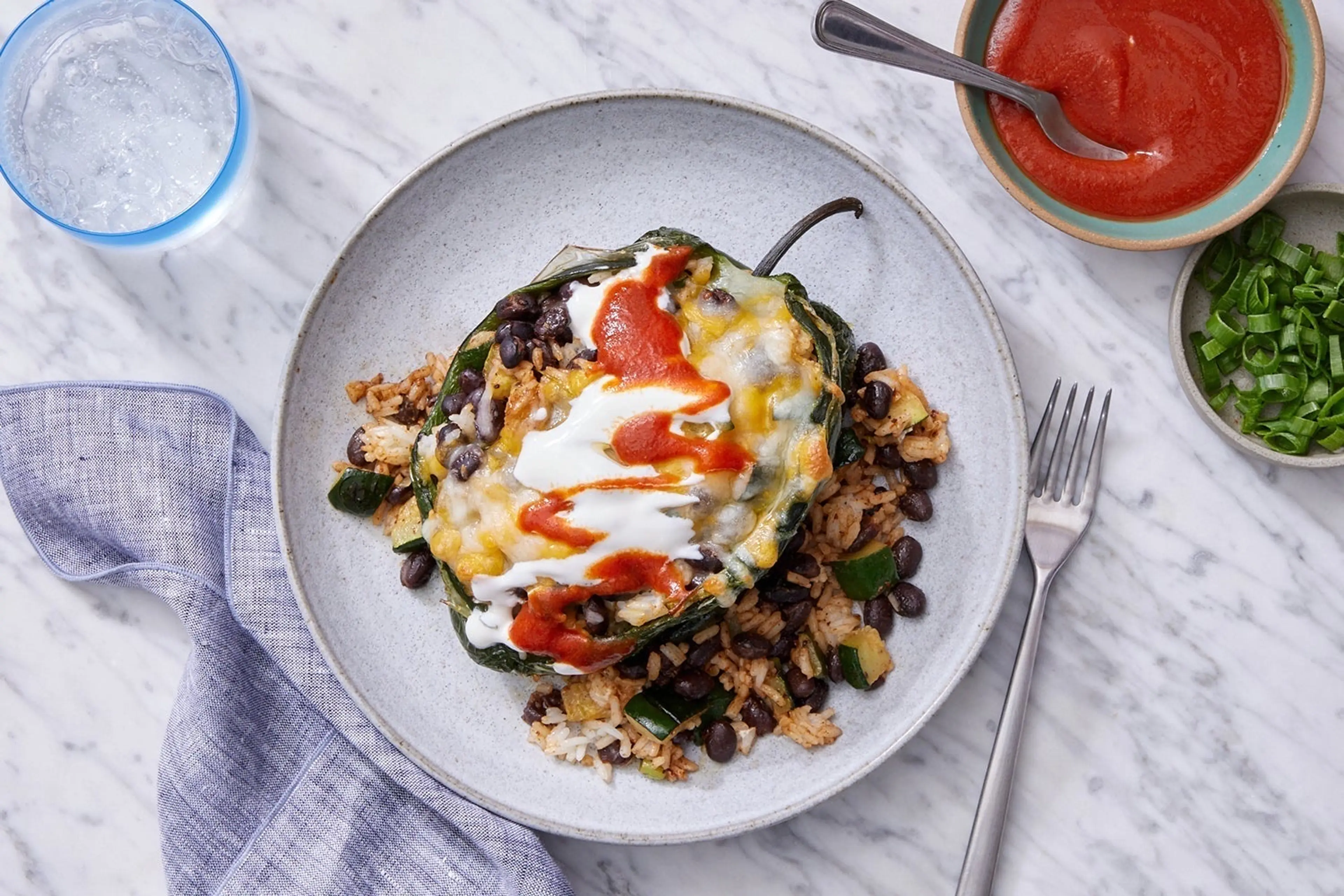 Black Bean & Veggie Stuffed Peppers with Rice, Cheese & Sour