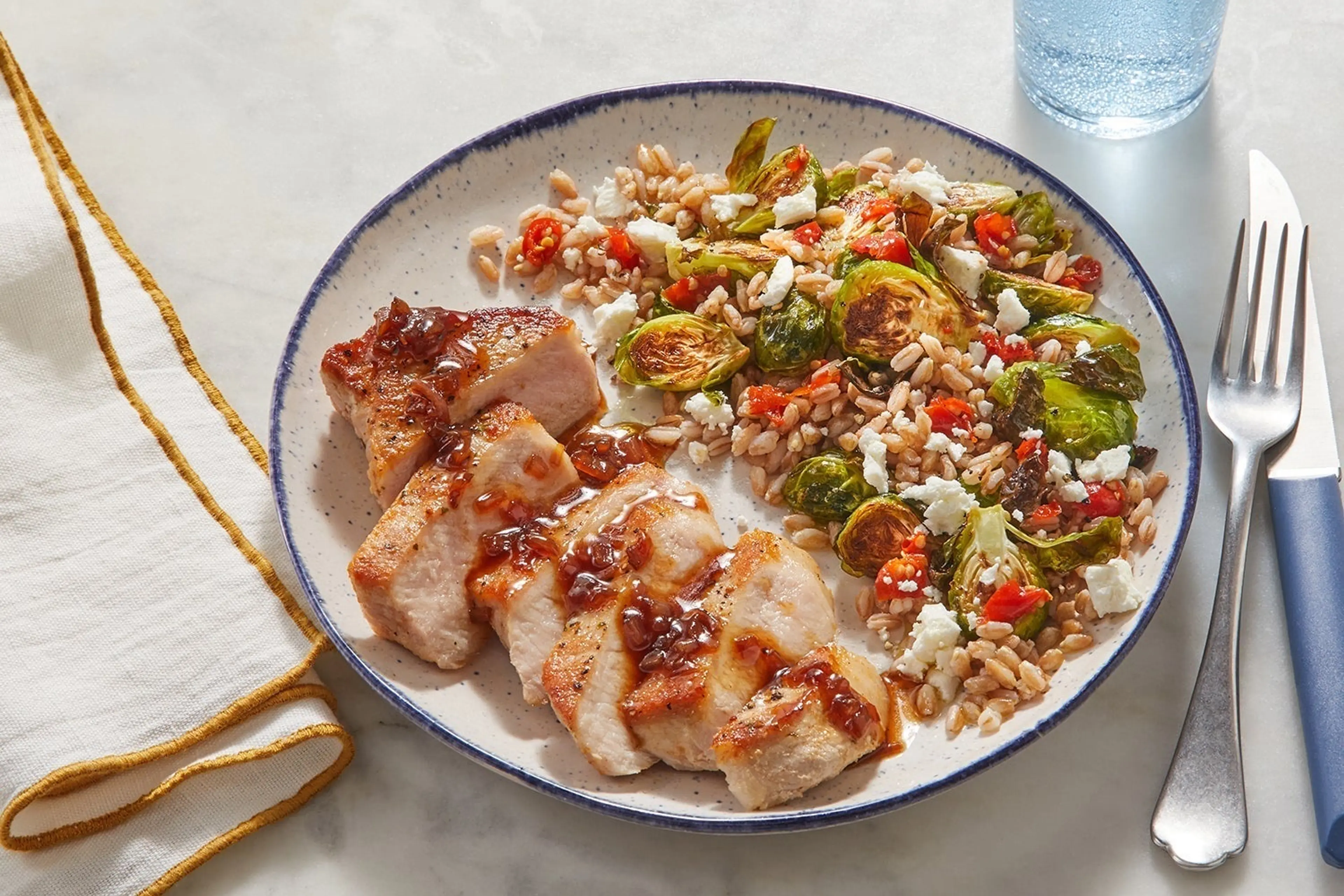 Pork Chops & Shallot Pan Sauce with Warm Farro, Brussels Spr