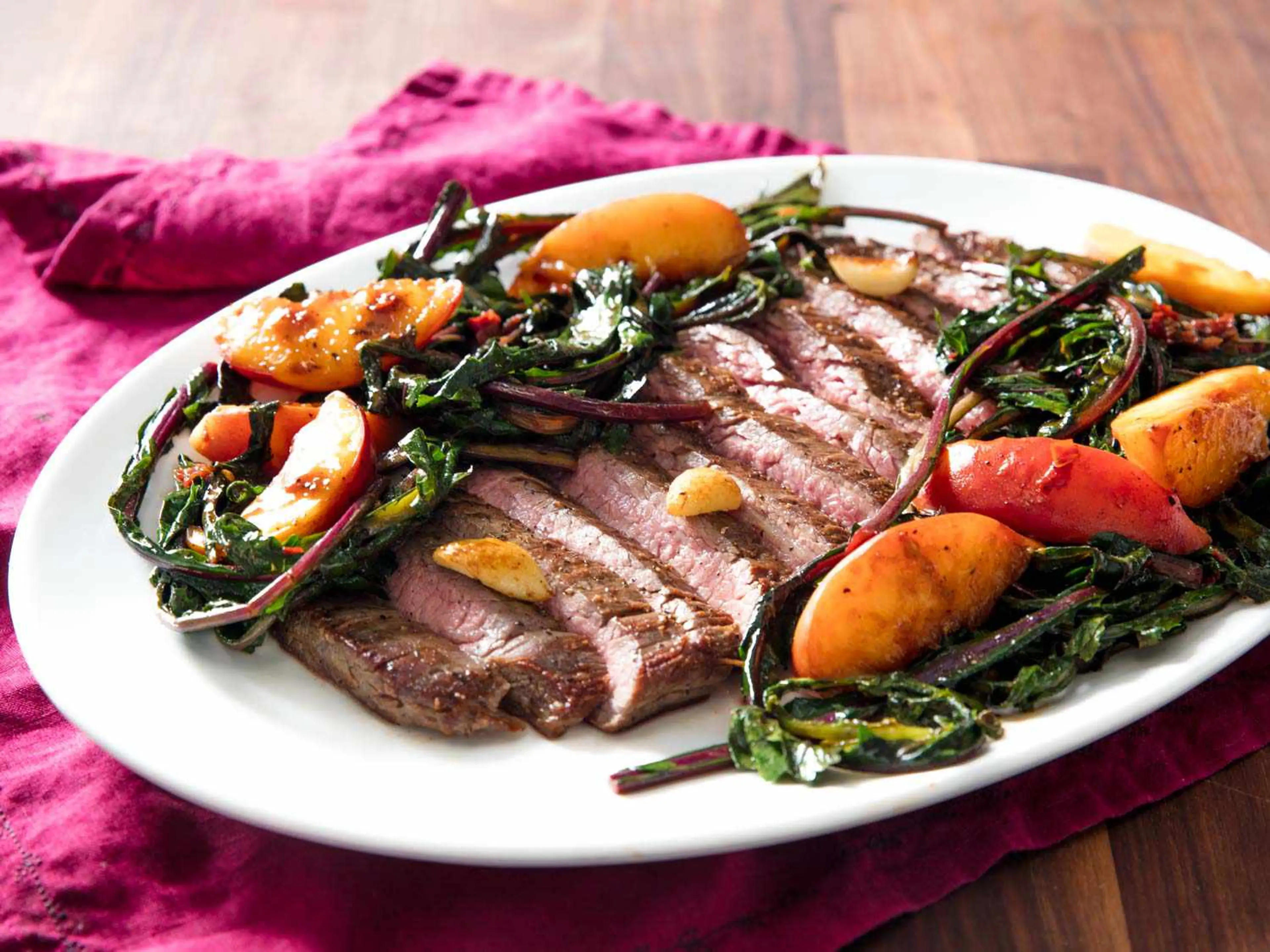 Pan-Seared Flank Steak With Peaches and Dandelion Greens Rec