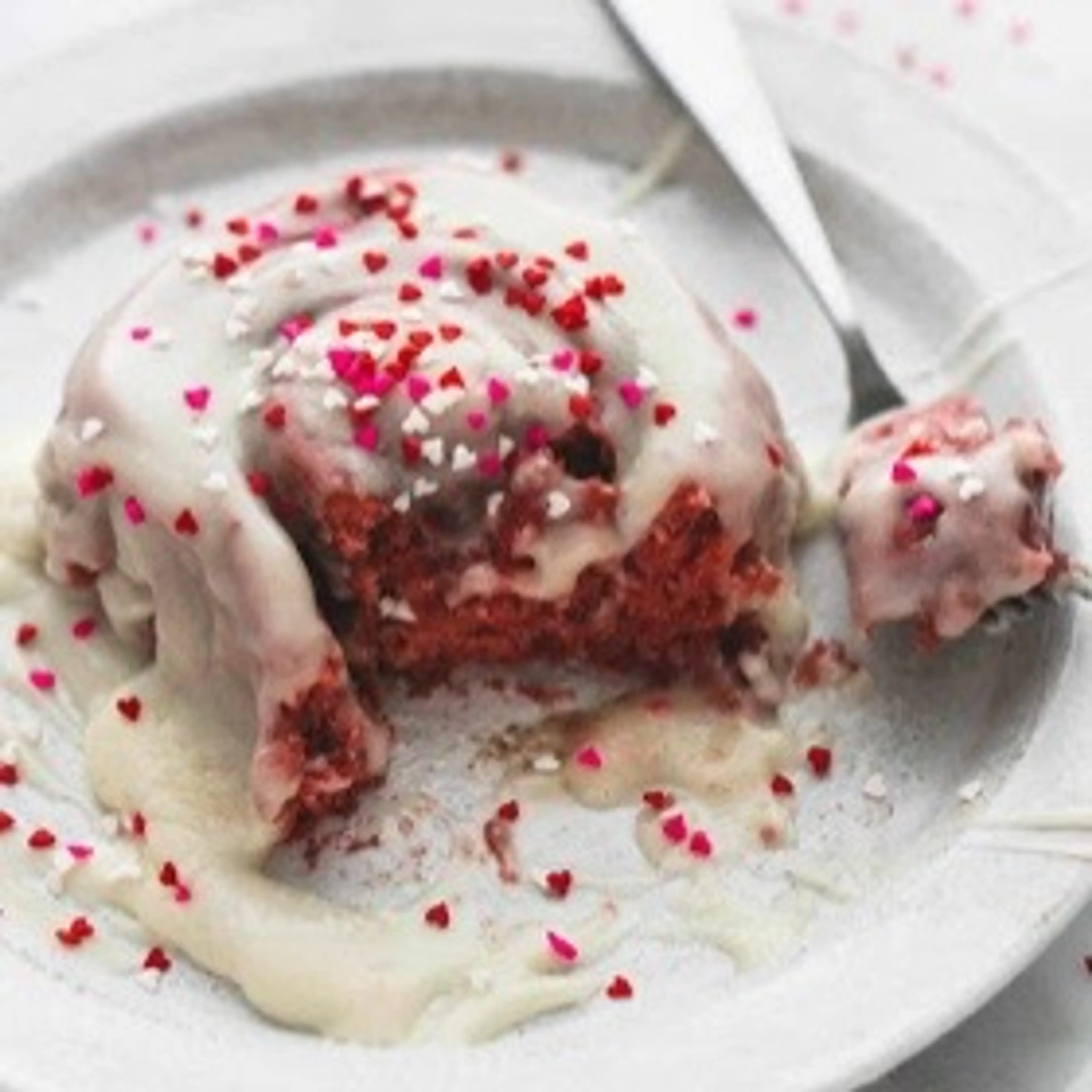 Red Velvet Cinnamon Rolls with Brown Butter Cream Cheese Fro