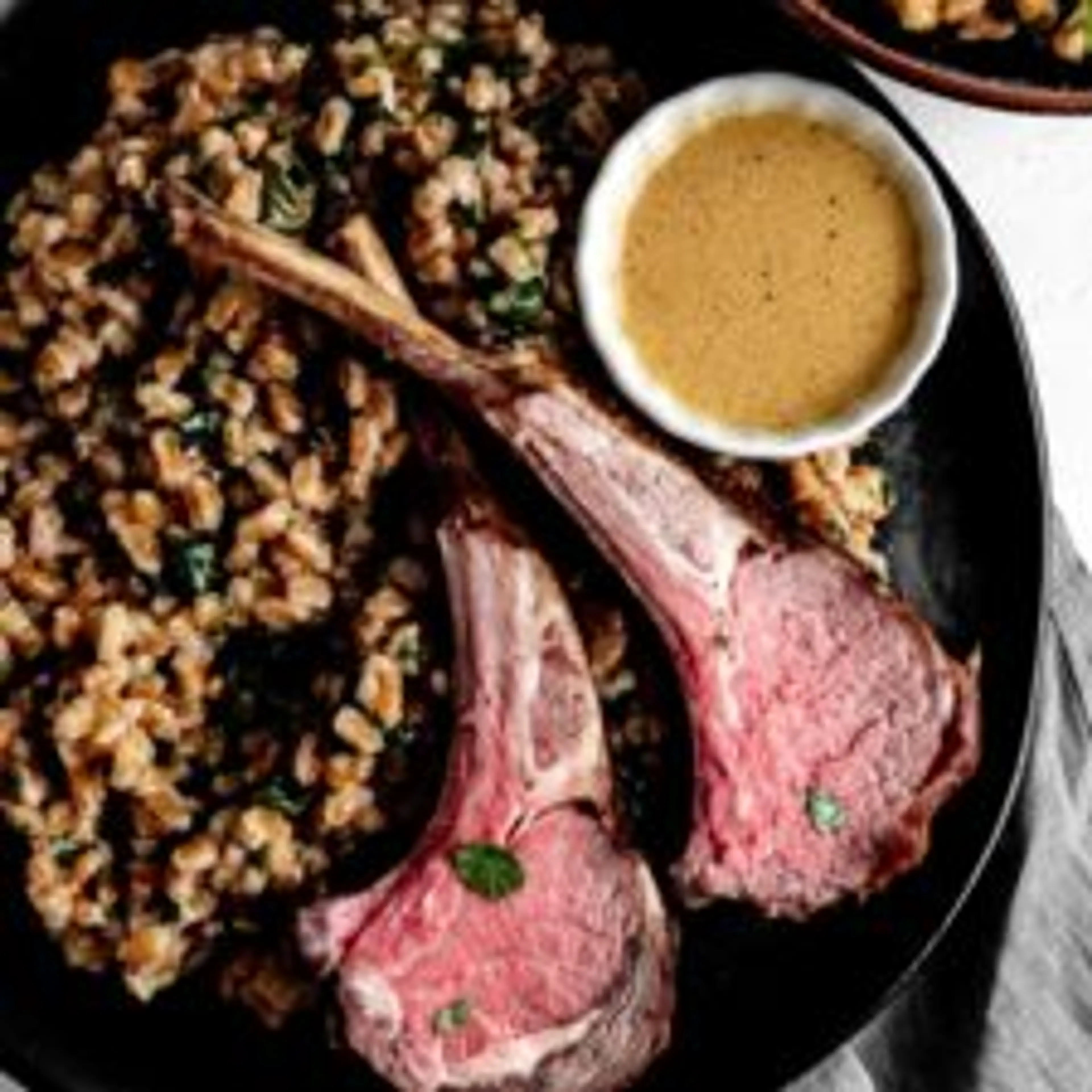 reverse sear rack of lamb with dijon mustard sauce + herby f